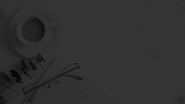 glasses and drink on a desk