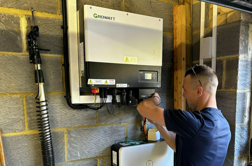 Neville Voss working on an electrical panel