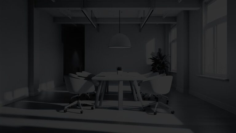 Conference-style office with a large table in the center and six chairs