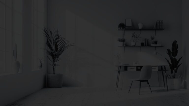 Simple office set up with table, chair, and decorative elements in a naturally lit room